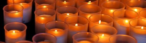 lots of burning votive candles